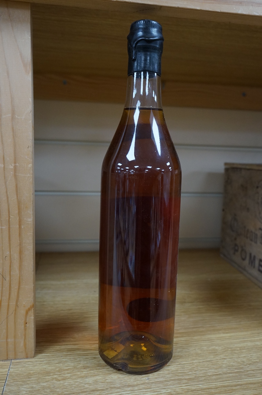 A bottle of Les Comtes De Cadignan Bas Armagnac. Condition - fair, from a local private cellar